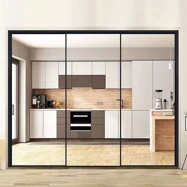 A sleek sliding barn door separating a bedroom from a bathroom.