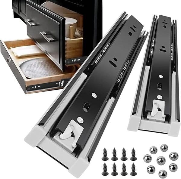 A person measuring a cabinet for drawer slides