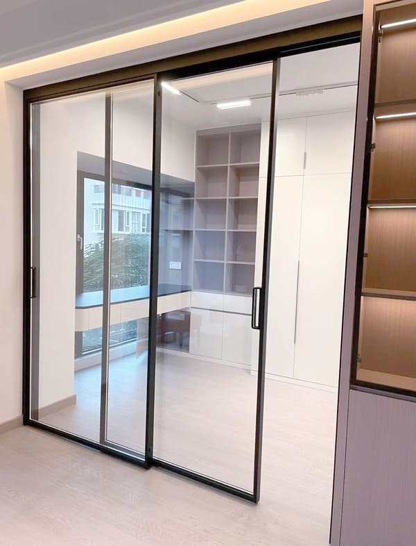 A peaceful room with a smoothly closing sliding wardrobe door