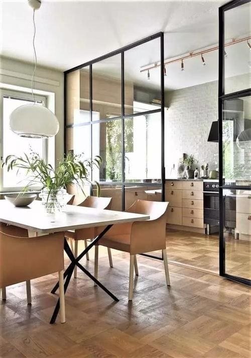 A small living room with one large, comfortable sofa