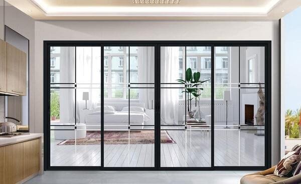 A person struggling to open a jammed sliding door