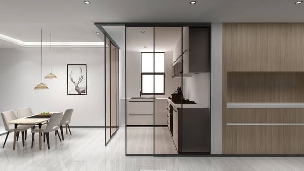 A wheelchair user easily passing through a barrier-free sliding door