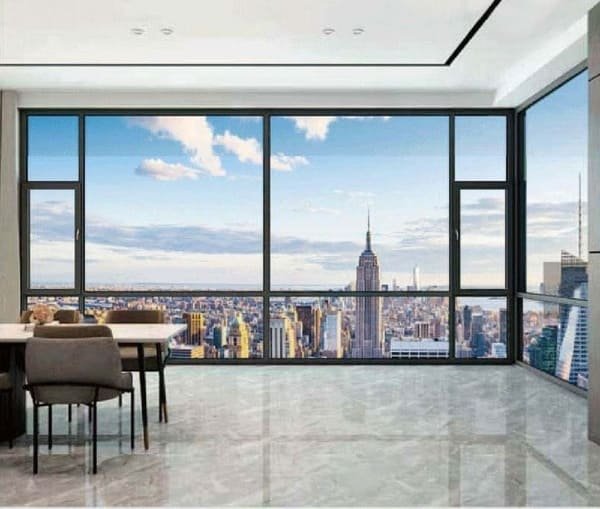 a close-up of a modern window lock and handle