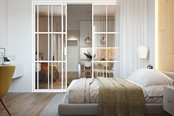 A sliding glass door showing its space-saving design in a compact room