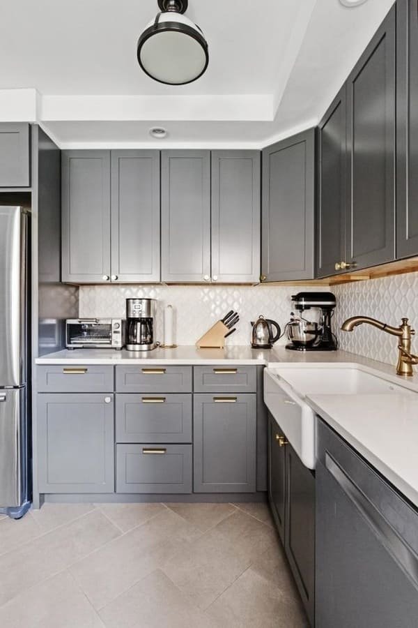 Close-up of a cabinet knob correctly placed on a door stile