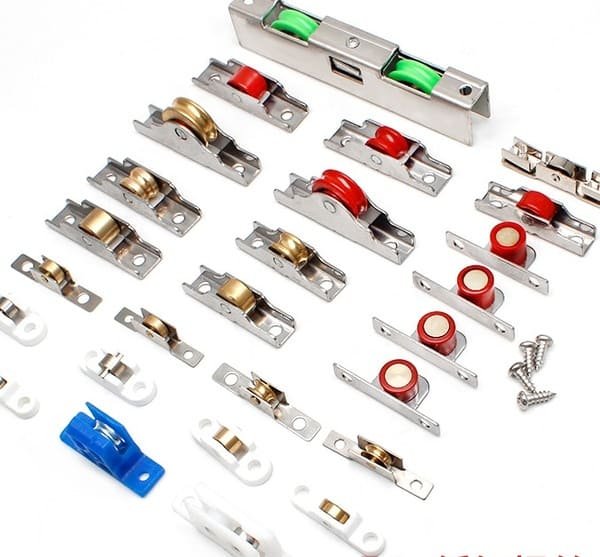 Two very different screen door rollers side-by-side for comparison