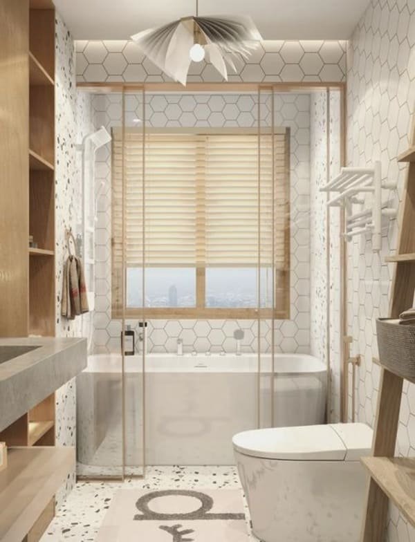 A compact bathroom with a sleek sliding pocket door.