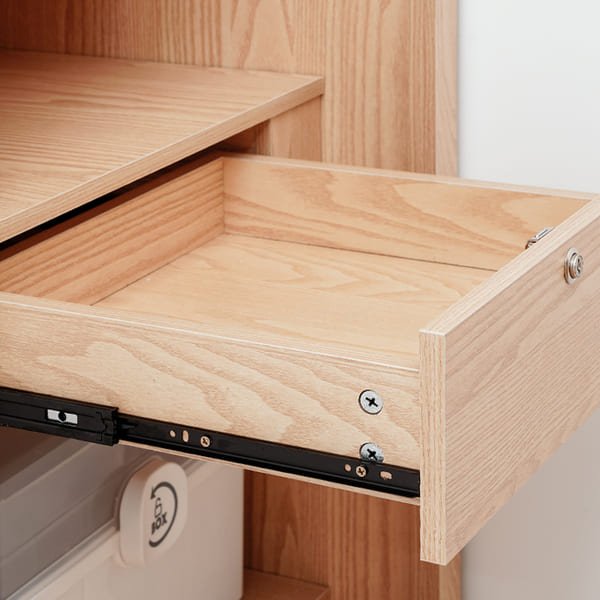 a side-by-side comparison of a traditional wooden drawer scraping and a modern drawer with runners gliding smoothly