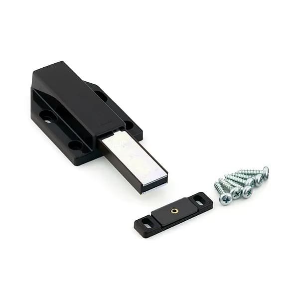 A push button cabinet latch ready for installation