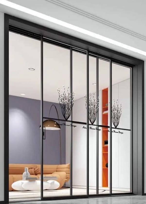 A sliding door in a small room showing the space saved