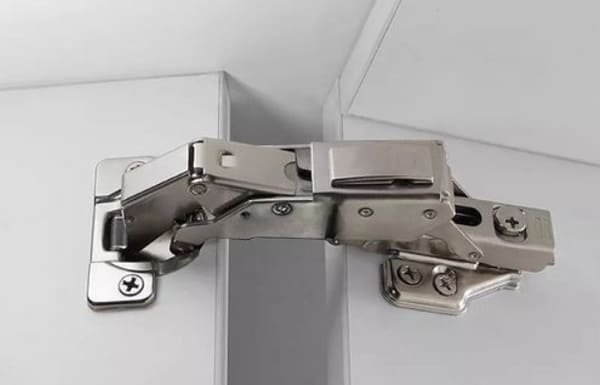 A soft-close cabinet hinge in action