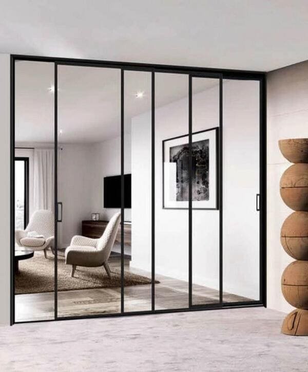 An assortment of stainless steel and aluminum sliding door rails