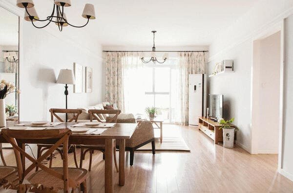 A small room painted in a light, airy color