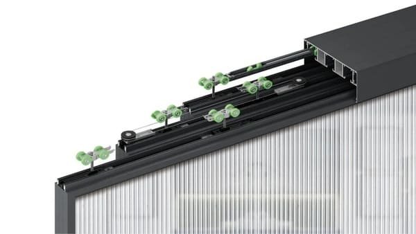 Close-up of a sliding door roller and bearing